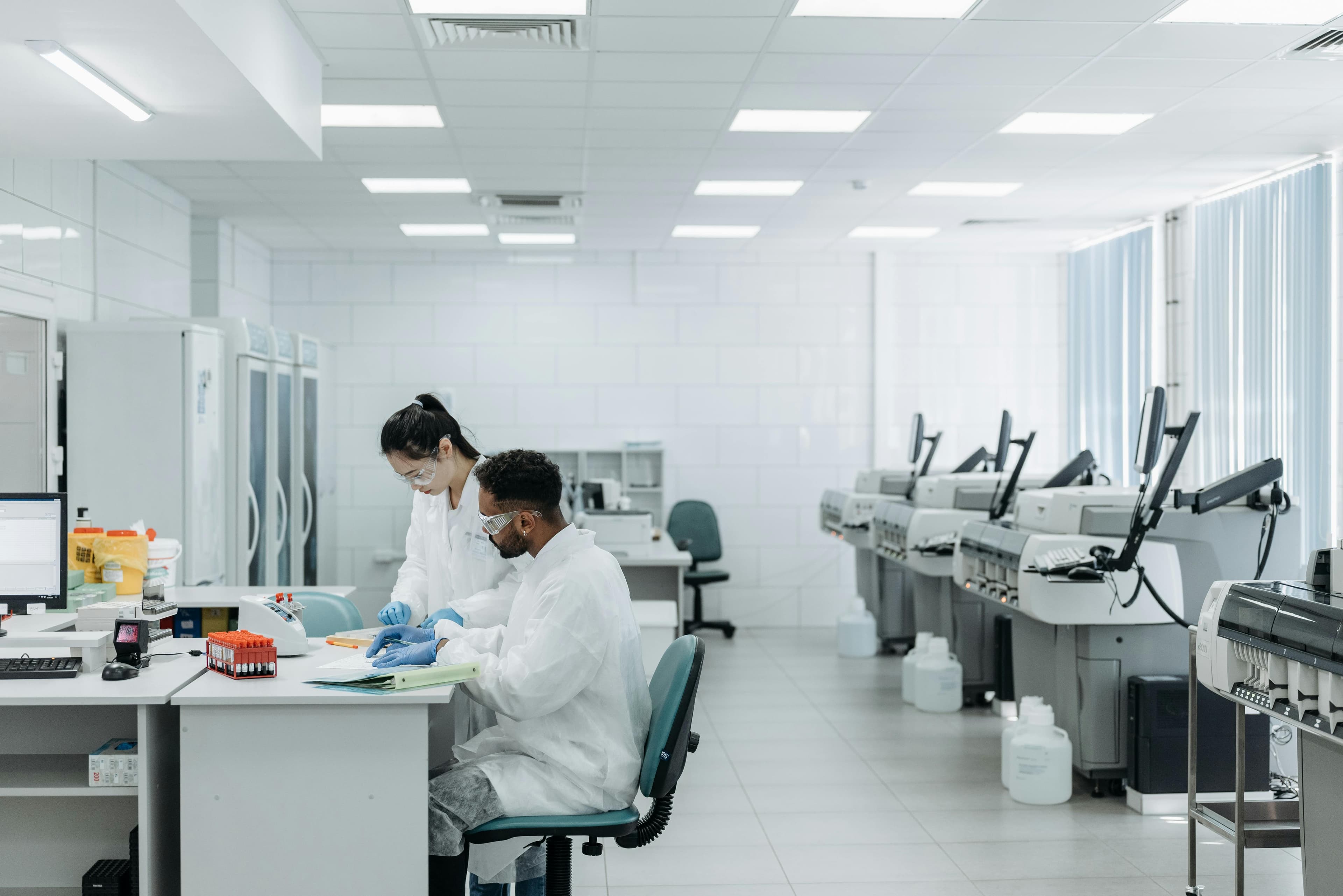 Scientists working in a laboratory, representing the early stages of clinical trials